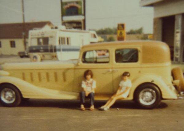 Kerri Beany as a child and her friend Michelle at the shop Beanys Mufflerland Kerri & Michelle